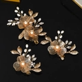 Three-piece gold filigree flower hair clips with pearls and crystals on black reflection - Gold Triple Style (HS-J7290G)