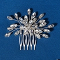 Detailed shot of silver bridal hair comb with marquise rhinestones on blue background - Fan-shaped Radial Style (HS-J6630S)
