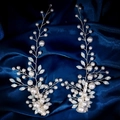 Close-up of handmade bridal hair clips with pearls and frosted leaves on blue silk - Duckbill Hair Clips / Gold