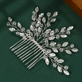 Close-up of a silver bridal hair comb with shimmering crystals and elegant metal branches - Bifurcated Branch Inspired Style (HS-J4481S)