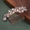 Detailed macro of rose gold bridal hair comb with marquise and pear-cut rhinestones - Intertwined Flower and Leaf Style (HS-J5280RG)