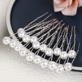 Elegante set di forcine a U con perle bianche tonde e design ondulato in metallo argento - Perla Singola Classica (Argento)