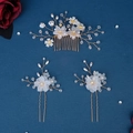Detail of bridal hair comb set with white flowers and pearls on blue background - Hs-j6424
