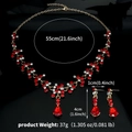 Parure de bijoux de mariée dorée de luxe avec strass rouges et clairs et boucles - Ensemble Collier Et Boucles d'Oreilles (NS-J6482GRED)