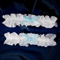 Elegant bridal lace garters set with blue bows and pearls on dark satin background - One Size / GS-J033 Style