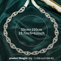 Detail of hand-sewn rhinestone bridal belt with silver base on green satin background - Wave Rhinestone Style (WS-J126S)