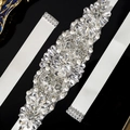 Close-up of handmade bridal sash featuring sparkling crystals and white pearls on satin ribbon - Flower Cluster Rhinestone (WS-J248S)