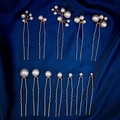 Detail of 12pcs gold U-shaped hair pins with handmade pearls on blue silk - Gold