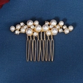 Close-up of elegant gold bridal hair comb with pearls and sparkling rhinestones - Horizontal Clustered Elegant Style (HS-J6600G)