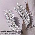 Dettagli degli orecchini a foglia in argento e zirconi con misura di 6cm di lunghezza - Stile Argentato (HS-J7421S)