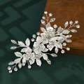 Detailed close-up of handmade bridal hair comb with silver floral rhinestones and crystals - Silver Floral Hair Clip (HS-J6505S)