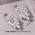 Detailed macro view of zircon leaf hair clips with silver-tone alloy duckbill clasp - Silver Style (HS-J7427S)