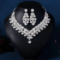 Detail of luxury bridal jewelry set with sparkling rhinestones on a necklace display stand - Silver Style 2
