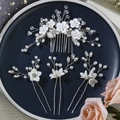Bridal hair set with white clay flowers, pearls and silver leaves on a blue plate - Zuhe-191s