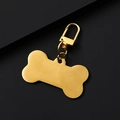 Polished gold bone-shaped metal pet ID tag with a sturdy lobster clasp on black background - 50x28mm+34mm Clasp / Gold