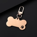 Rose gold bone-shaped metal pet ID tag with hollow paw print and swivel lobster clasp - Large Bone (Hollow Paw) 34mm Clasp / Rose Gold