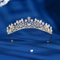 Golden bridal crown with white pearls and sparkling crystals on blue silk background - Gold Pearl Floral Rhinestone Style (TS-J3134G)