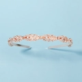 Roségoldener Braut-Haarreif mit funkelnden Strass-Blättern auf hellblauem Hintergrund - Roségold
