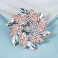 Eleganter roségoldener Kranz-Brosche mit Marquise-Kristallen und glitzernden Strass - Roségold