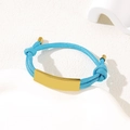 Adjustable bright blue braided rope bracelet with polished gold rectangle metal plaque - Blue Rope / Gold Metal Plate