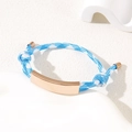 Adjustable blue and white checkered braided rope bracelet with a gold metal plate - Blue White Rope / Rose Gold Metal Plate
