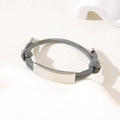 Minimalist adjustable gray braided rope bracelet with a polished silver metal plaque - Grey Rope / Silver Metal Plate