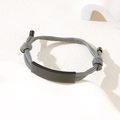 Adjustable grey braided rope bracelet featuring a matte black stainless steel bar tag - Grey Rope / Black Metal Plate