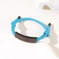 Adjustable bright blue woven bracelet with a curved black metal tag for custom engraving - Blue Rope / Black Metal Plate