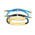 Detail of woven fiber couple bracelets with golden heart charms and magnetic accents - Gold Plate (Black and Light Blue Rope)