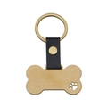 Detailed view of bone-shaped gold metal tag with paw cutout and black leather strap - Gold Paw Cutout Bone Style / Gold Leather 50x27.6mm Bone (Paw Cutout) Keychain