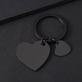 Detalle de dos colgantes de metal en forma de corazón negro pulido para grabado láser - Corazón Inclinado + Corazón Inclinado Pequeño (Negro)
