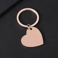 Portachiavi a forma di cuore in acciaio inossidabile oro rosa lucido su sfondo nero - Portachiavi Cuore Oro Rosa