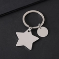 Close-up of polished stainless steel star and circle pendants for custom laser engraving - Silver Star Circle Keychain