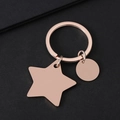 Rose gold stainless steel star and round disc keychain for custom engraving on black background - Rose Gold Star Circle Keychain