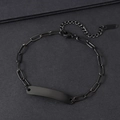 Detail of matte black stainless steel paperclip bracelet with engravable metal plate - Black