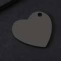 Detail view of heart-shaped black stainless steel tag with laser-cut hole for engraving - 30*28.5mm Slanted Heart Black
