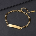 Golden stainless steel paperclip chain bracelet with a blank rectangular curved bar tag - Gold