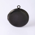Macro detail of a round black metal locket pendant with a matte brushed finish - Round Plain Locket Pendant Black