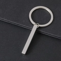 Detailed close-up of a blank solid rectangular pillar pendant on a silver metal keychain - Silver Cuboid Bar With Key Ring / Silver Style