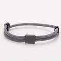 Detail of grey braided Milanese cord bracelet with minimalist black square metal clasp - Square Charm (Double Buckle) / Gray