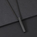 Macro shot of minimalist black brushed stainless steel bar pendant with bead chain - Cube Column Pendant + Pearl Chain / Black Necklace