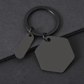 Macro detail of matte black stainless steel hexagon and oval blank metal keychains - Black Hexagon Oval Keychain