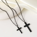 Close-up of black matte stainless steel cross pendants on a white silk fabric - Small (21x14) / Black
