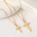 Golden stainless steel cross pendant necklaces in two sizes on white silk background - Small (21x14) / Gold