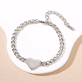 Macro detail of silver stainless steel Cuban link bracelet with a blank heart pendant - Heart Tag (Silver)