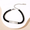 Detail of stainless steel bracelet featuring black crystals and customizable blank metal bar - Silver Black Stone