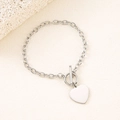 Polished stainless steel toggle bracelet with heart pendant on textured backdrop - Silver 20mm Heart Toggle Bracelet
