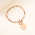 Close-up of rose gold heart pendant bracelet with a classic toggle clasp design - Rose Gold 20mm Heart Toggle Bracelet