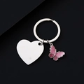 Detail of custom heart tag and pink glitter butterfly charm on stainless steel keychain - Silver 30mm Slanted Heart Butterfly Style