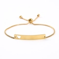 Detail view of golden box chain bracelet with heart cutout and adjustable bolo clasp - Gold Heart Cutout Bar / Gold